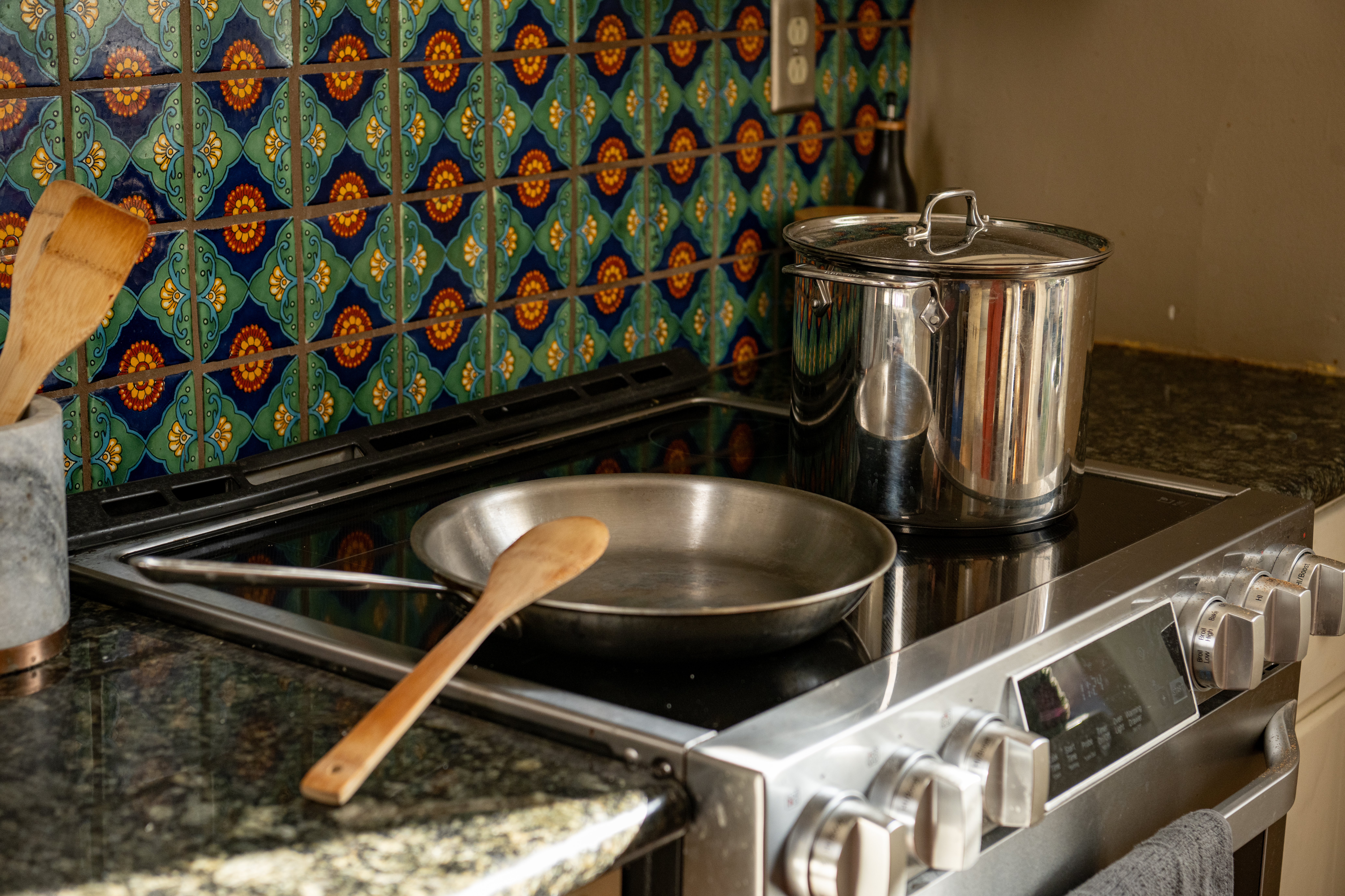 Induction stove top with a pot and pan