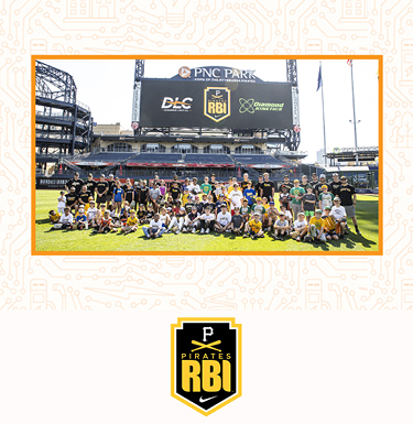 Boys and girls on baseball field for RBI partnership event